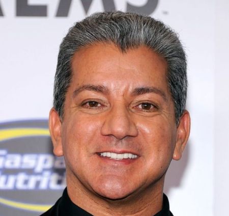 Bruce Buffer poses a picture in an interview.